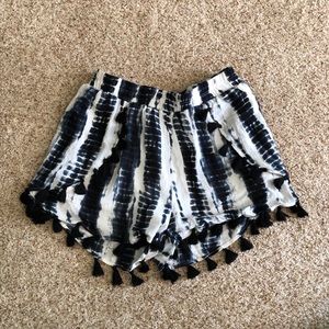 Blue and white tie dyed shorts with poms